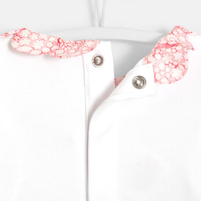 Baby girl bodysuit with petal collar