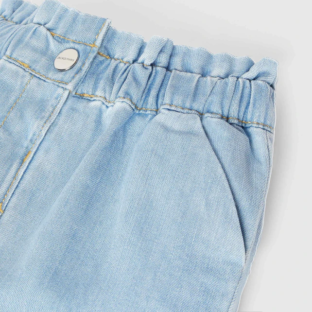 Baby girl trousers in light denim